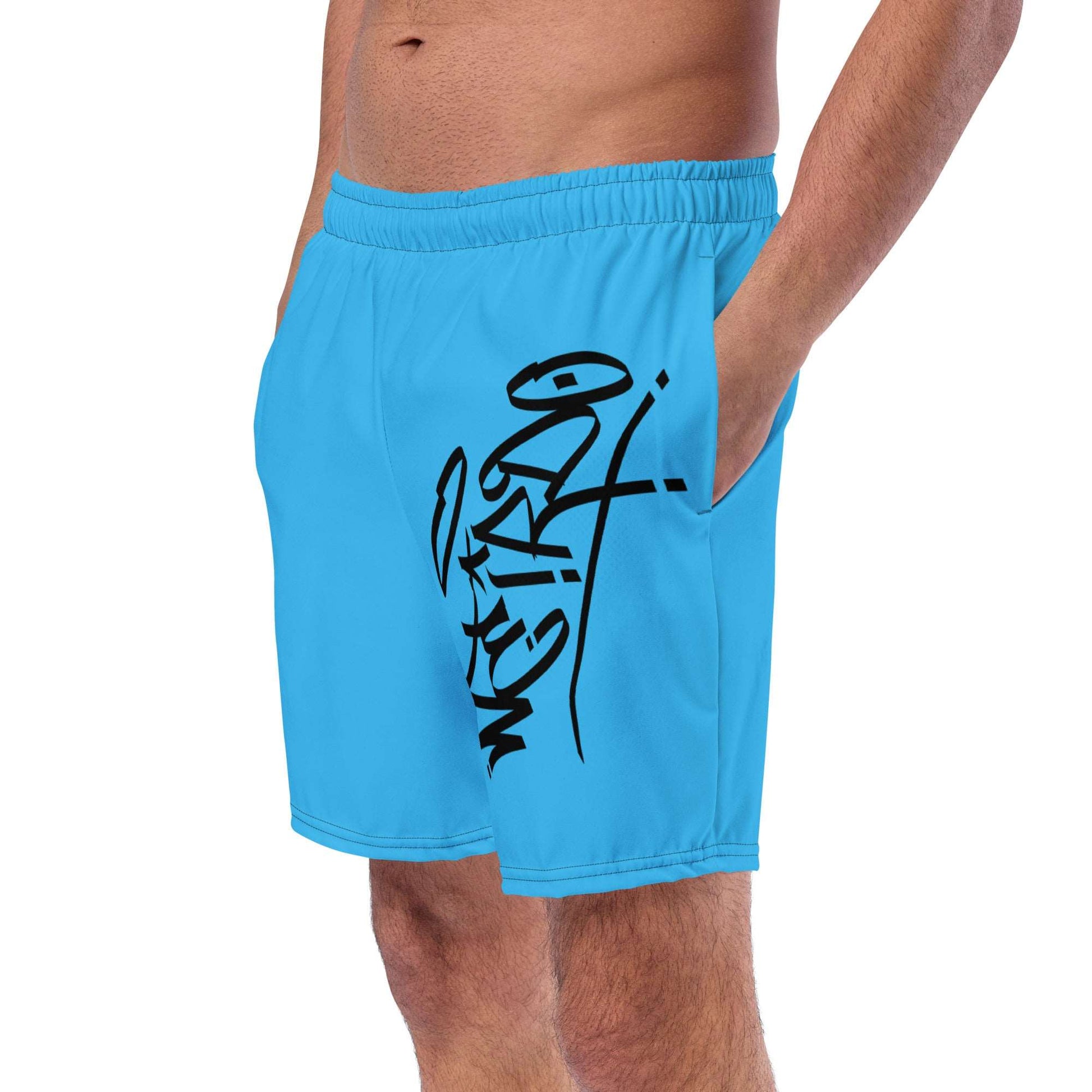 side man wearing weirdo tag swim shorts blue by B.Different Clothing independent streetwear inspired by street art graffiti