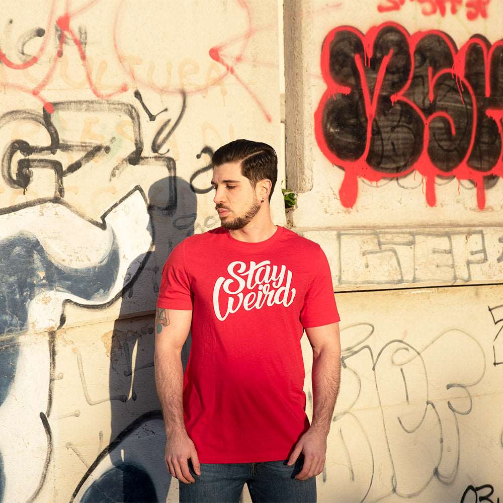man with Stay Weird tee red by B.Different Clothing independent streetwear inspired by street art graffiti