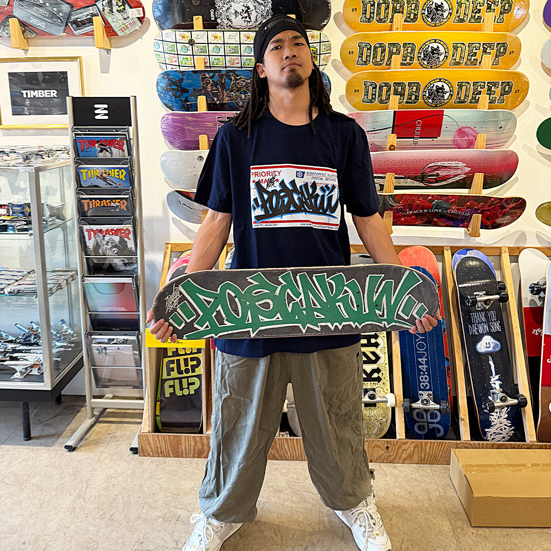 Navy t-shirt, Poscakn wearing Priority Mail Graffiti Sticker Tee by B.Different Clothing.