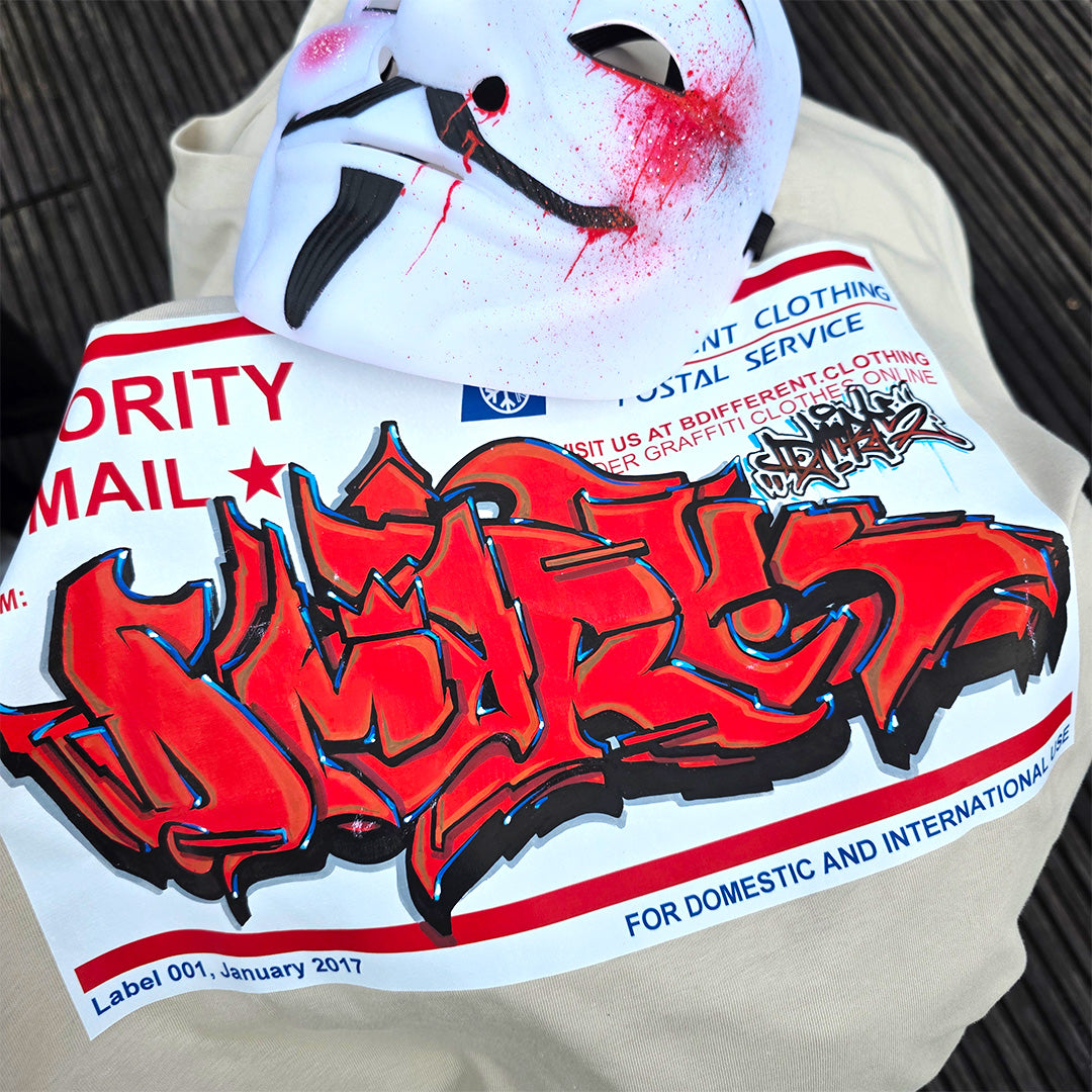 Beige-Dmark custom Priority Mail Sticker Graffiti Tee from B.Different Clothing, graffiti-inspired streetwear t-shirt