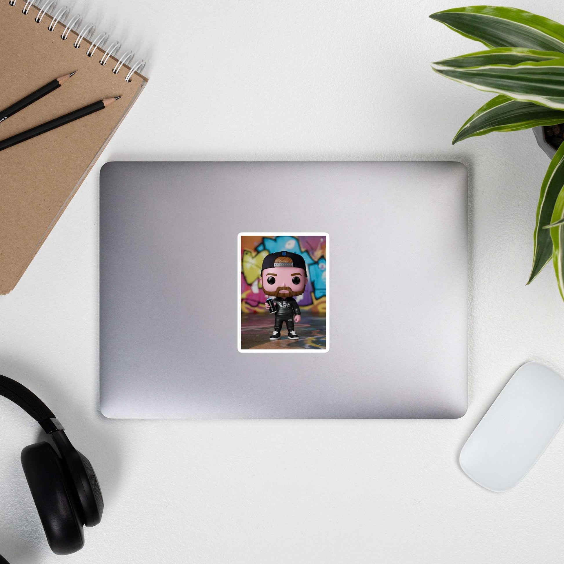 laptop with graffiti artist vinyl figure sticker B.Different Clothing graffiti street art inspired streetwear brand