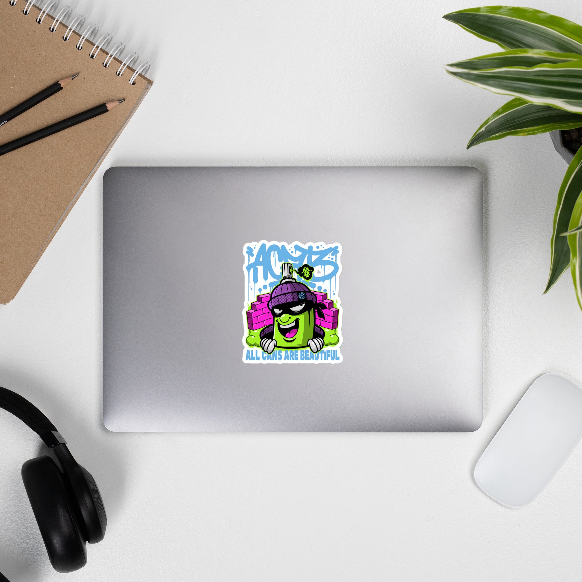 Laptop with ACAB Graffiti Character Sticker from B.Different Clothing, graffiti-inspired streetwear