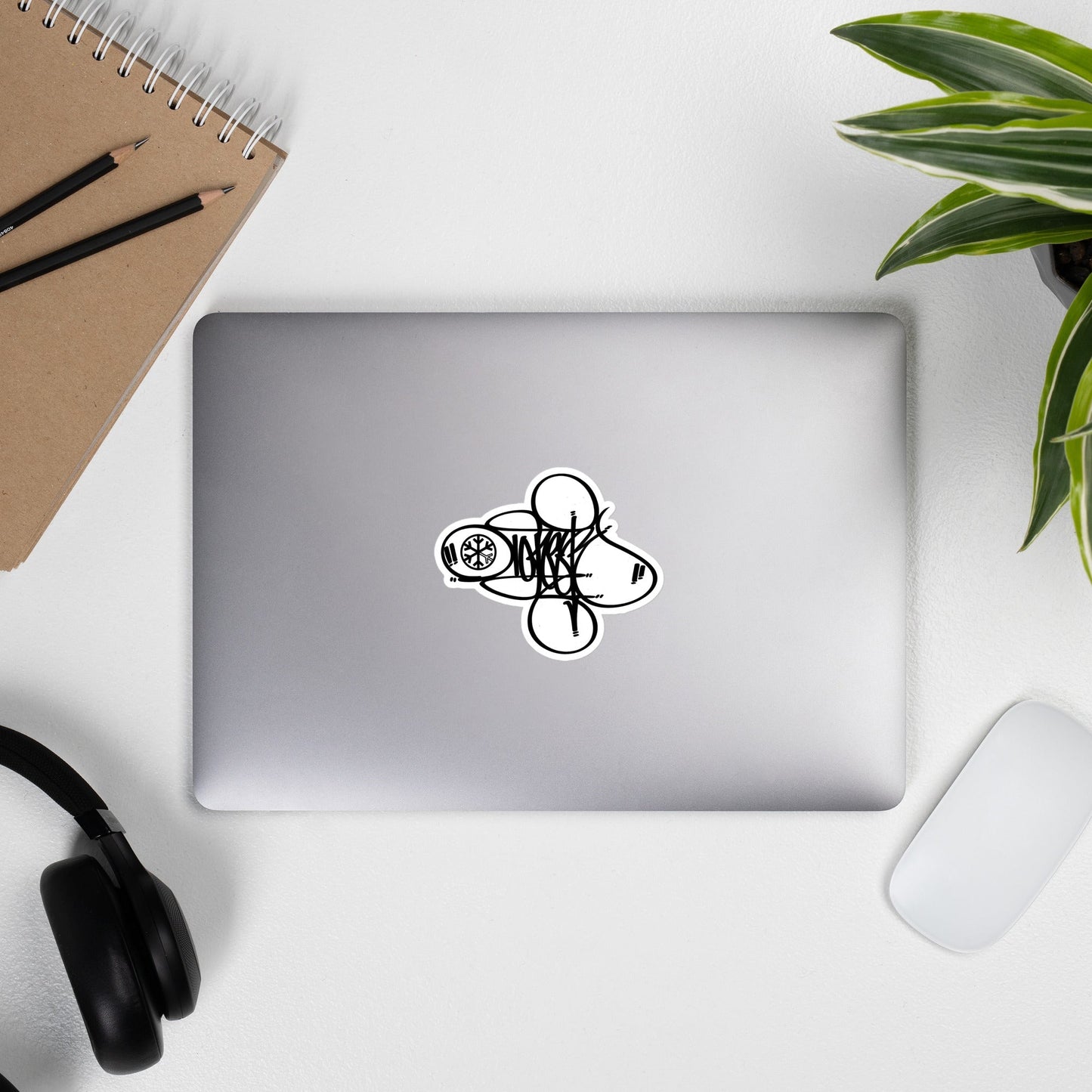Laptop with Loner Tag Sticker by Graffiti Dad from B.Different Clothing, graffiti-inspired streetwear