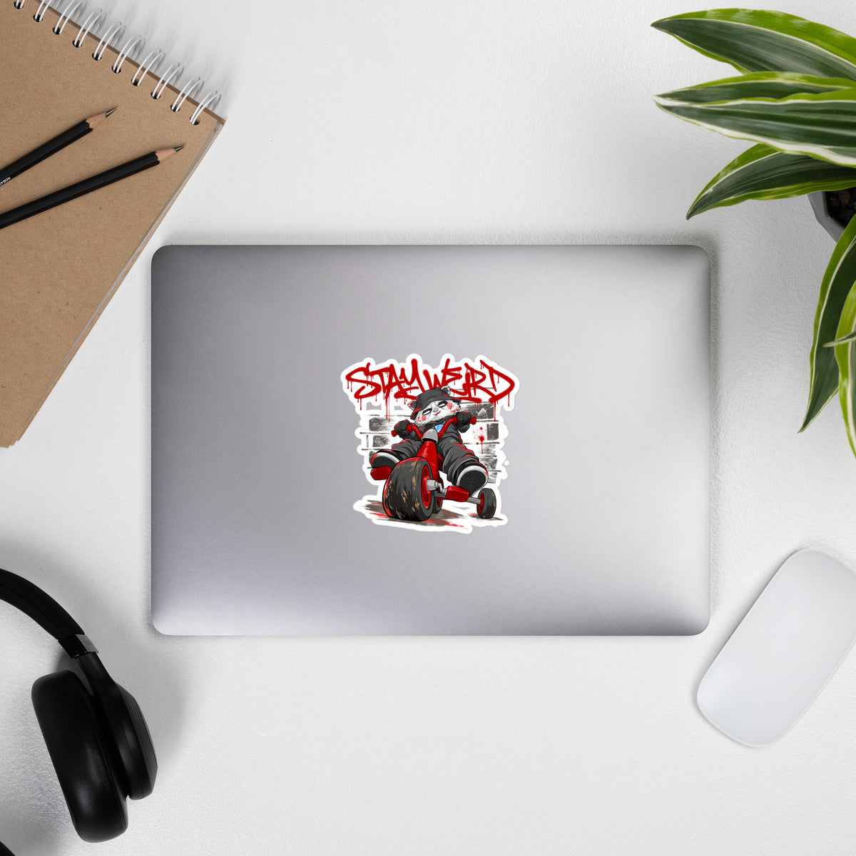 Laptop with Raks The Puppet Graffiti Sticker by Emti from B.Different Clothing, graffiti-inspired streetwear