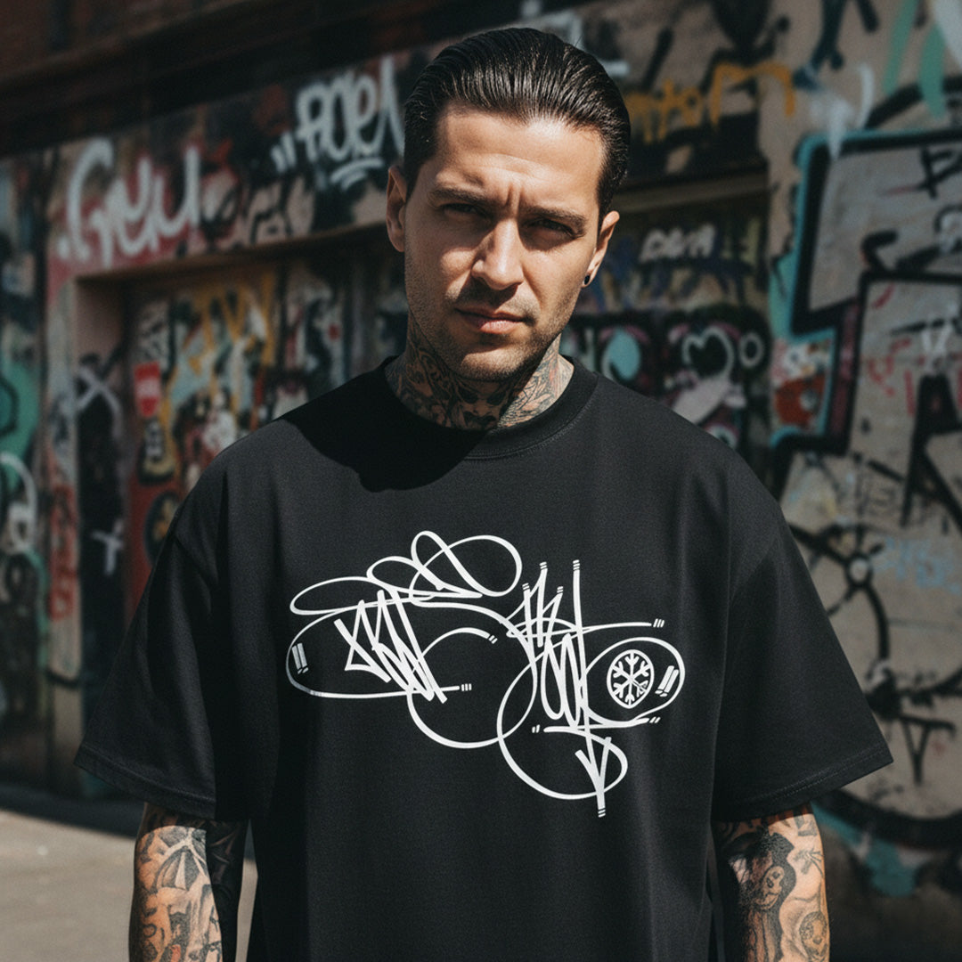 Black-Misfit Tag Tee by Graffiti Dad from B.Different Clothing, male model, graffiti-inspired streetwear, oversized heavyweight t-shirt