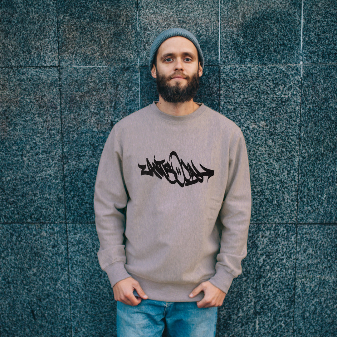 man wearing Antisocial Graffiti Tag sweatshirt gray B.Different Clothing graffiti street art inspired streetwear brand