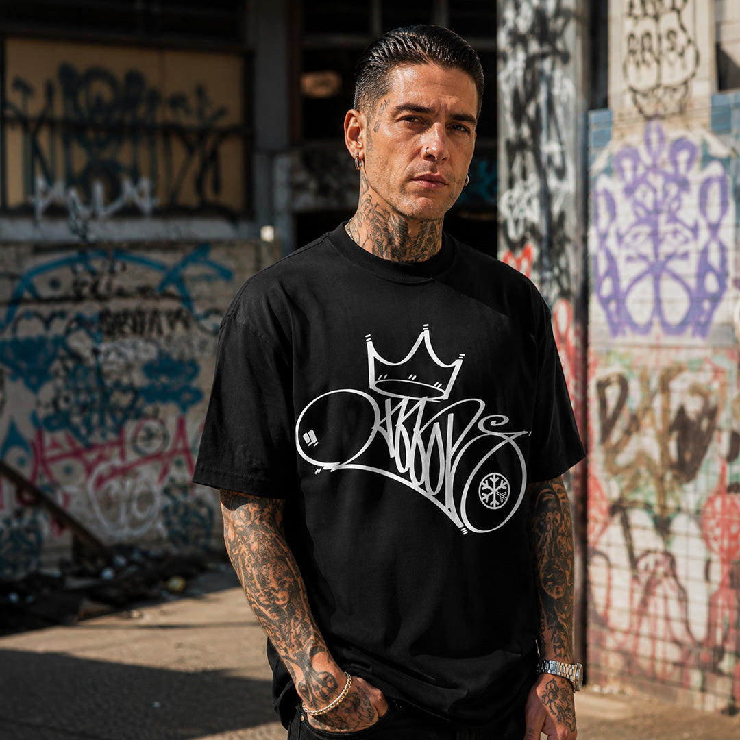 Black-Mop King Tag Tee by Graffiti Dad from B.Different Clothing, male model, graffiti-inspired streetwear t-shirt