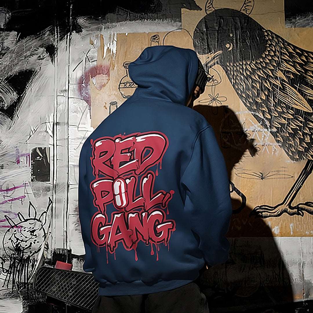 man wearing red pill gang hoodie navy B.Different Clothing graffiti street art inspired independent streetwear brand