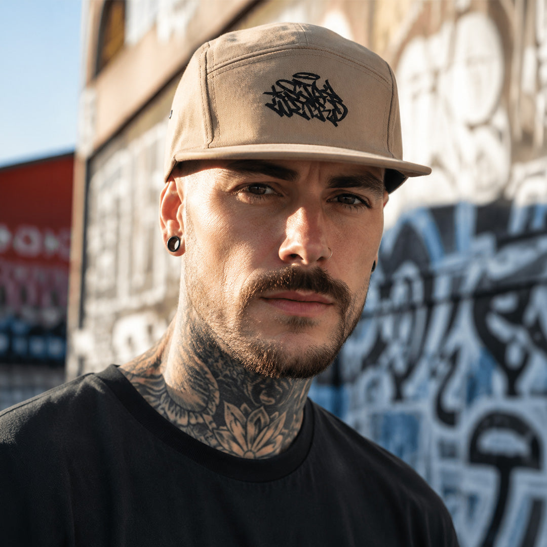 Khaki-Stay Weird Graffiti Tag 5-Panel Snapback Hat from B.Different Clothing, male model, graffiti-inspired streetwear