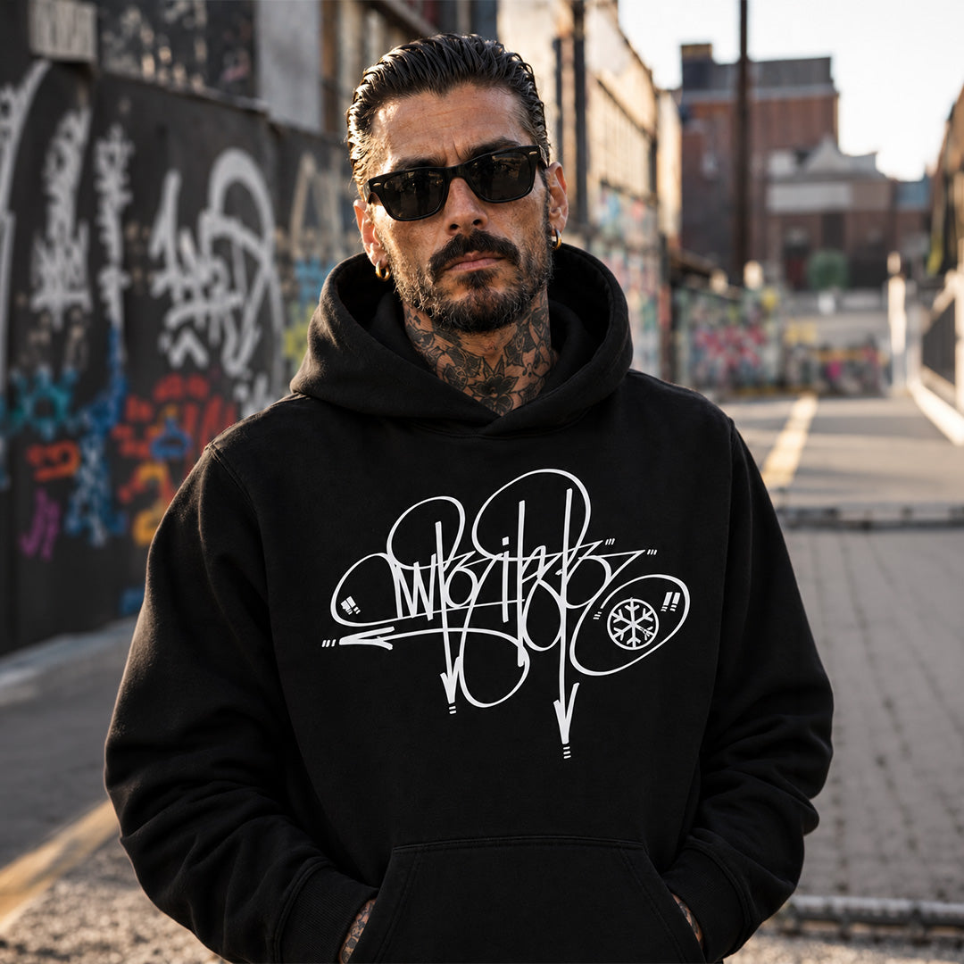 Black-Writer Tag Hoodie by Graffiti Dad from B.Different Clothing, male model, graffiti-inspired streetwear, oversized heavyweight