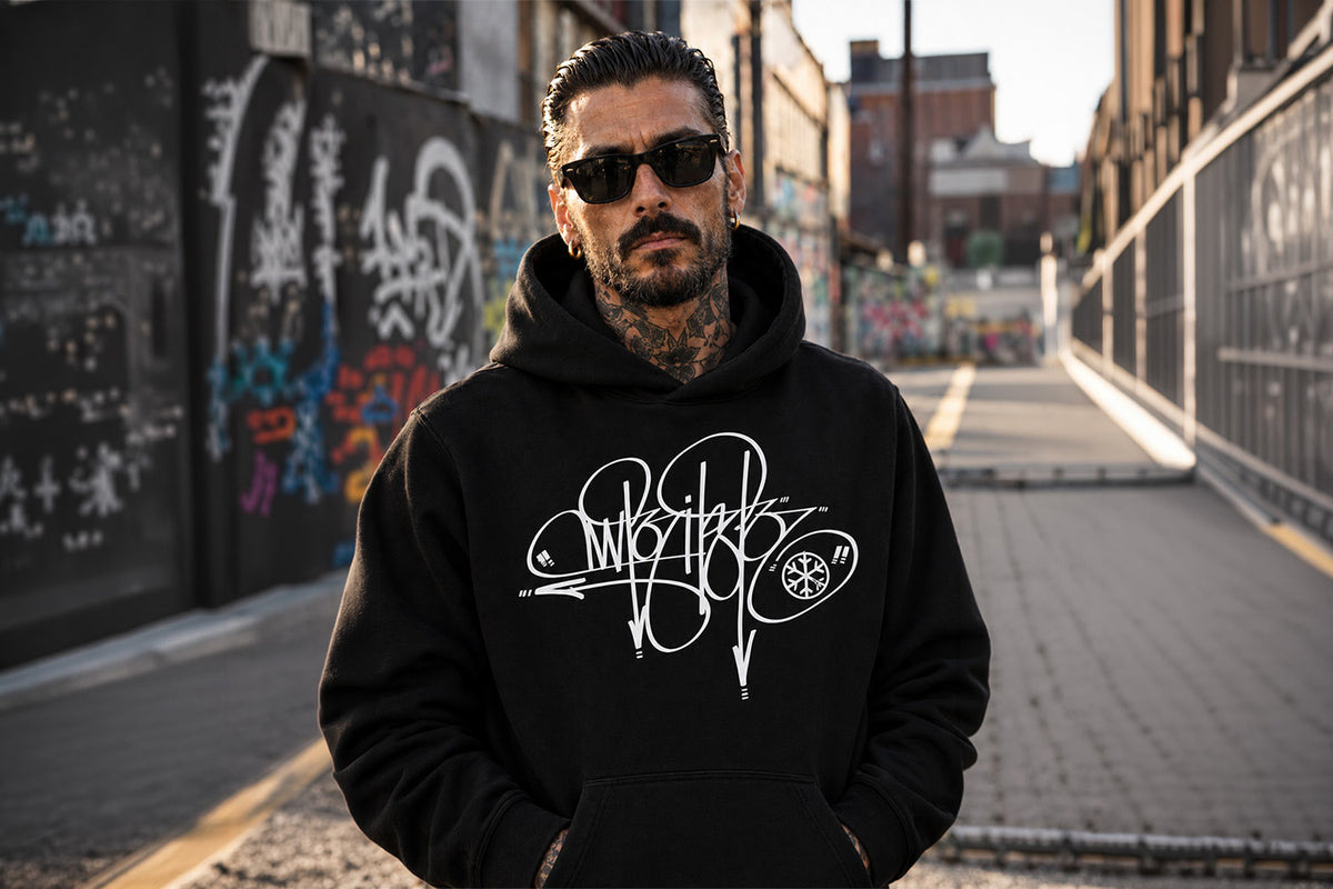 Man wearing Writer Tag Hoodie by Graffiti Dad from B.Different Clothing, graffiti-inspired streetwear