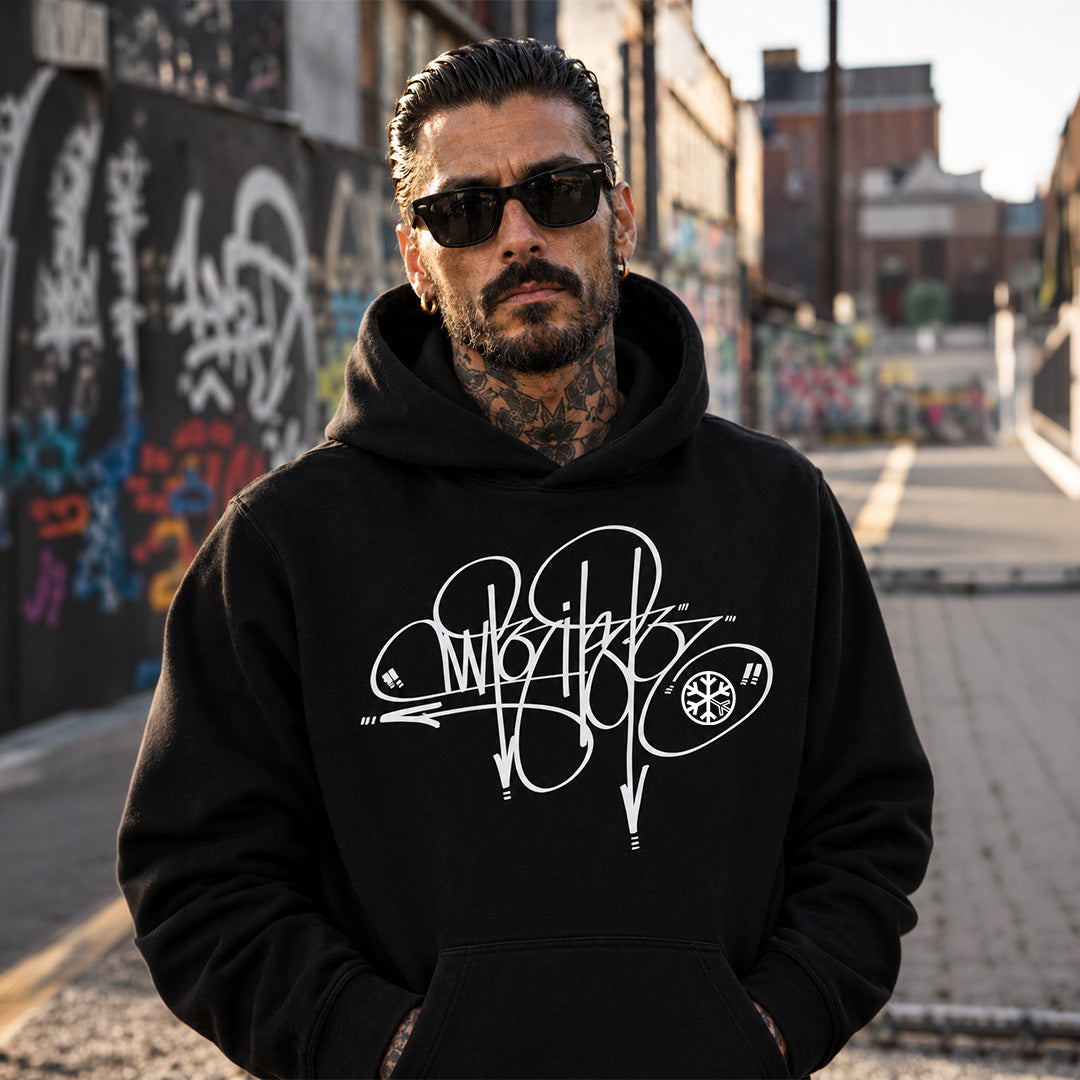 Black-Writer Tag Hoodie by Graffiti Dad from B.Different Clothing, male model, graffiti-inspired streetwear, oversized heavyweight