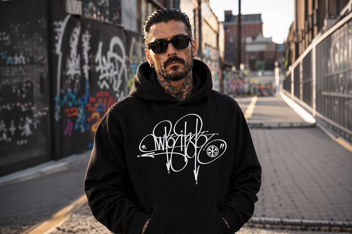 Man wearing Writer Tag Hoodie by Graffiti Dad from B.Different Clothing, graffiti-inspired streetwear
