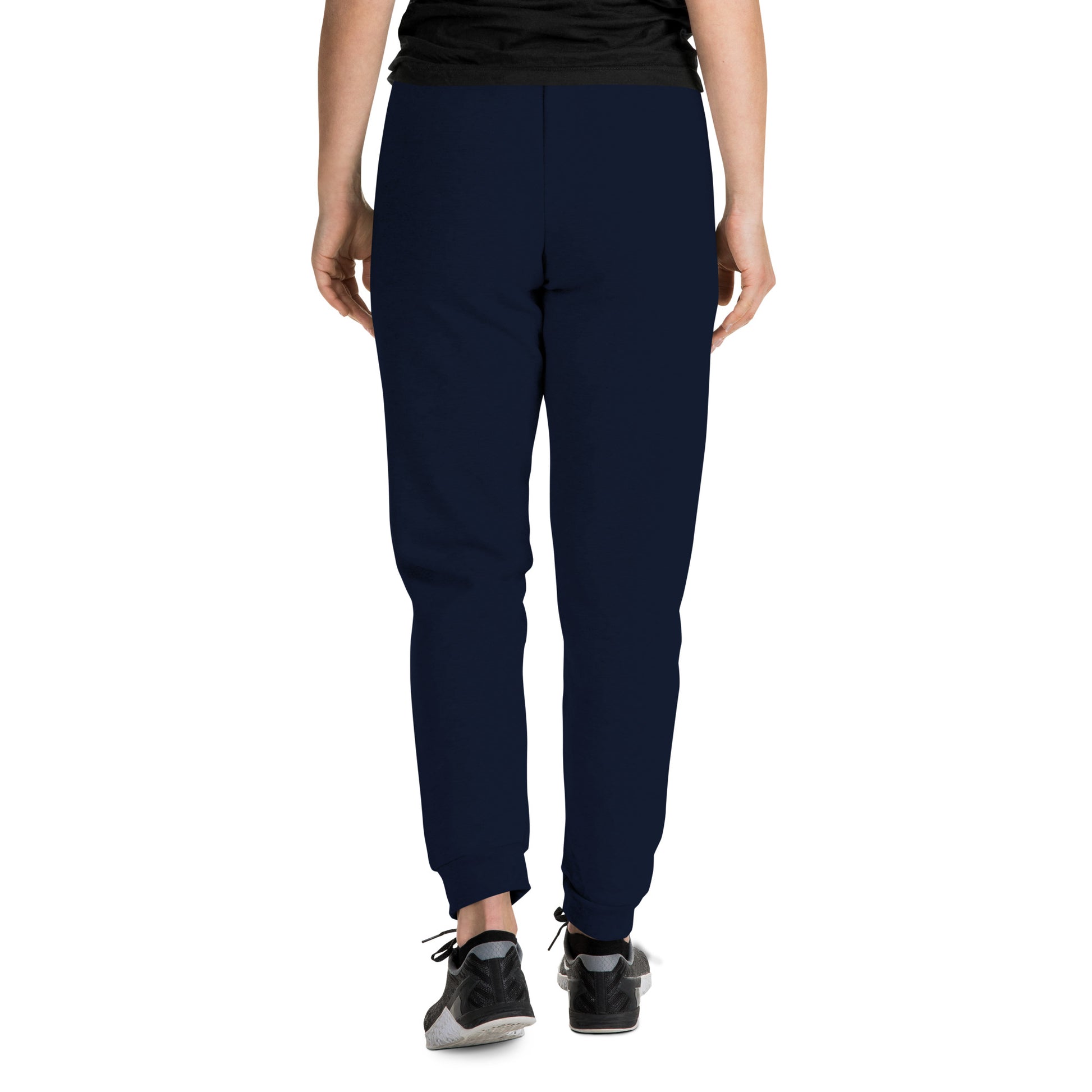 front of woman wearing Outcast Graffiti Tag Joggers navy B.Different Clothing graffiti street art inspired streetwear brand