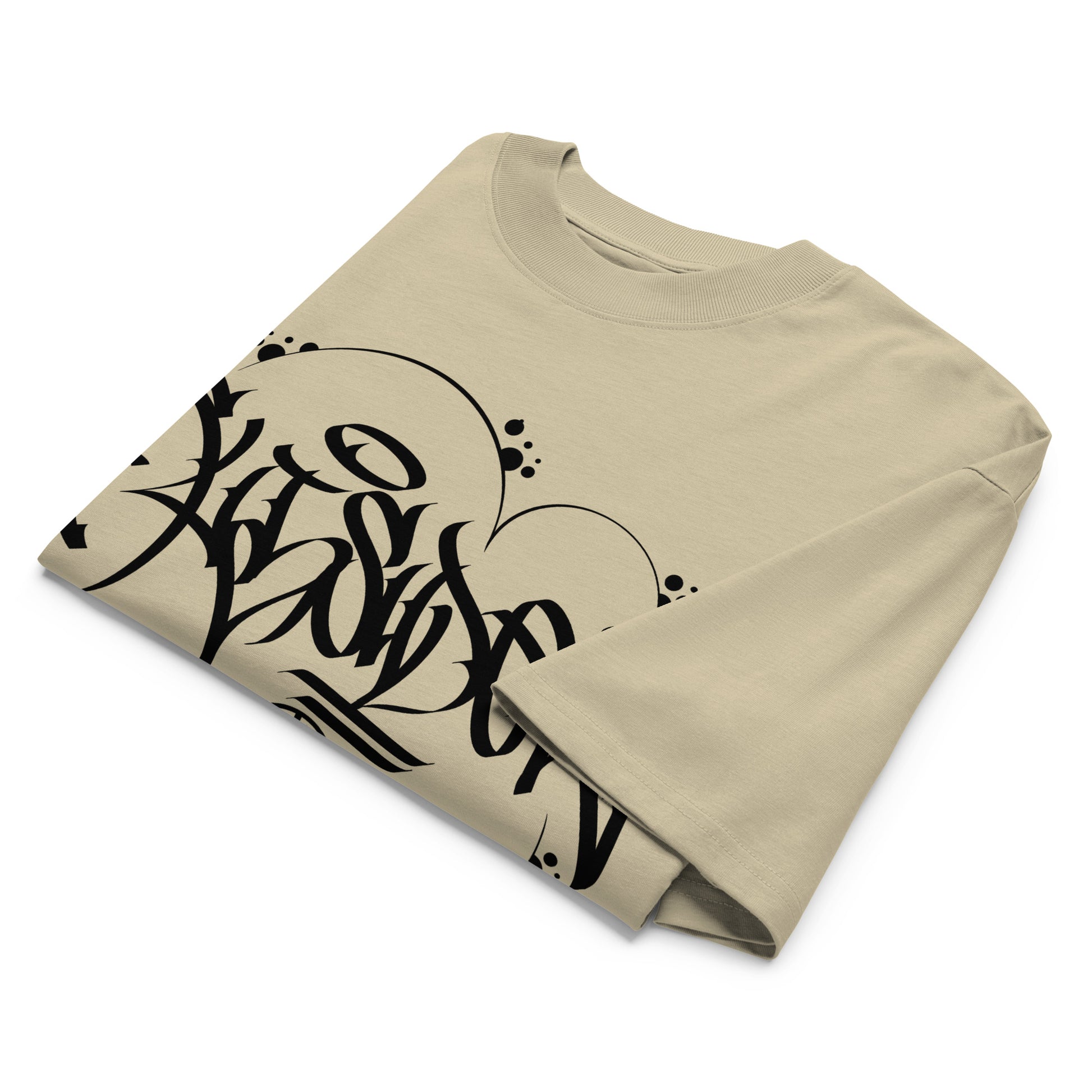 Beige-Outsider Graffiti Tag Tee by Caos One from B.Different Clothing, folded, graffiti-inspired streetwear, oversized heavyweight t-shirt