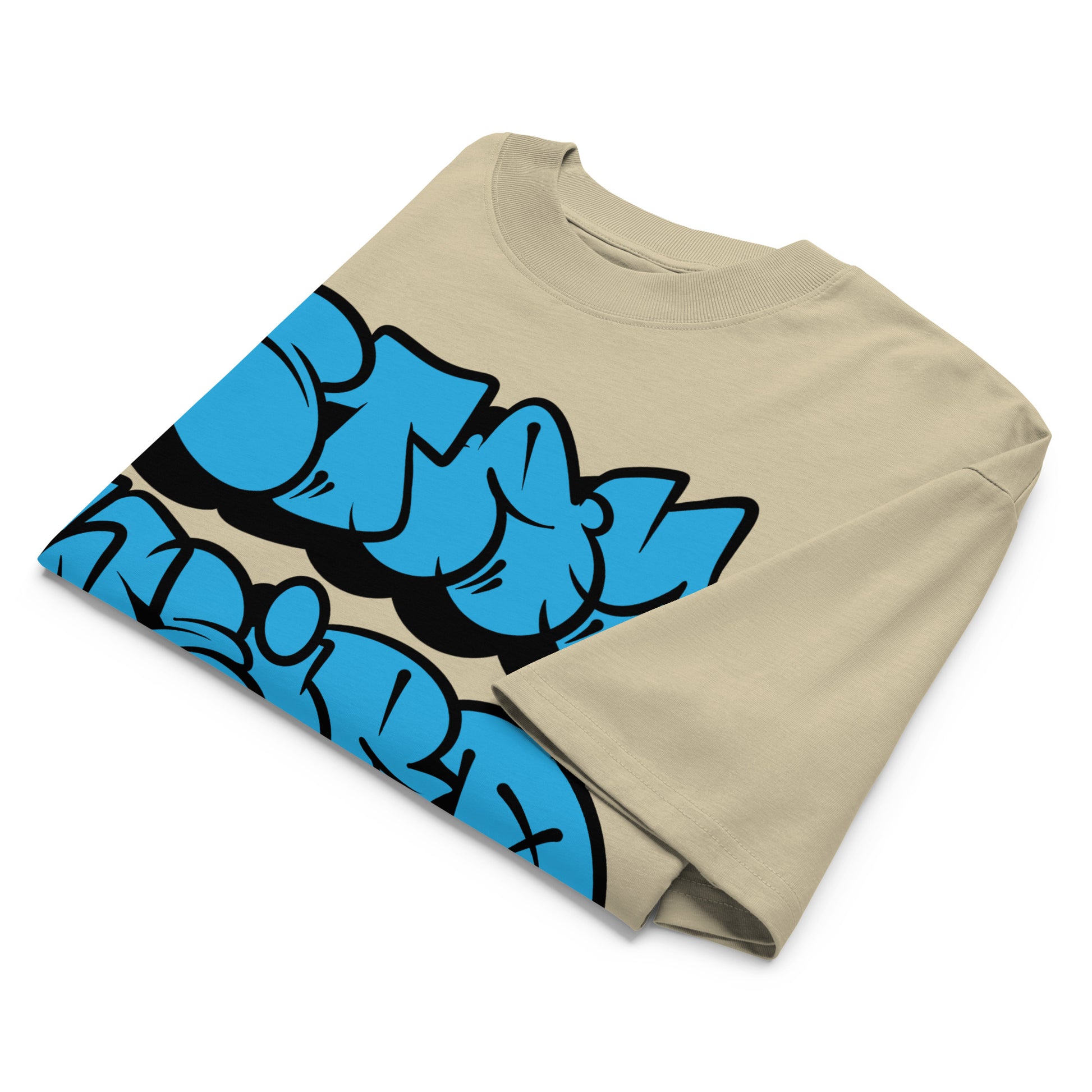 Beige-Stay Weird Graffiti Throwie Tee by Monsterinho from B.Different Clothing, folded, graffiti-inspired streetwear, oversized heavyweight t-shirt