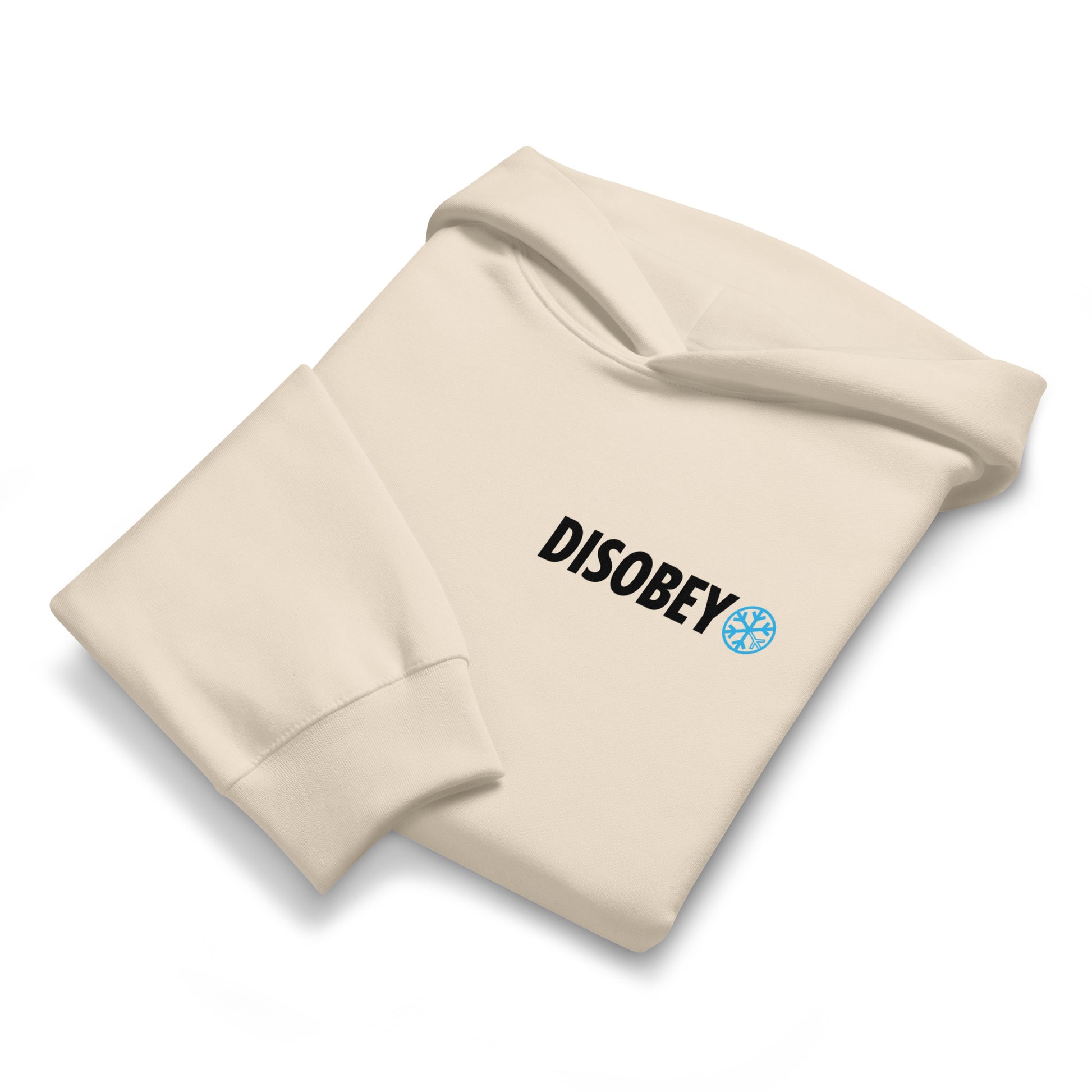 Biege-Pixel Disobey Hoodie from B.Different Clothing, folded, graffiti-inspired streetwear, oversized heavyweight