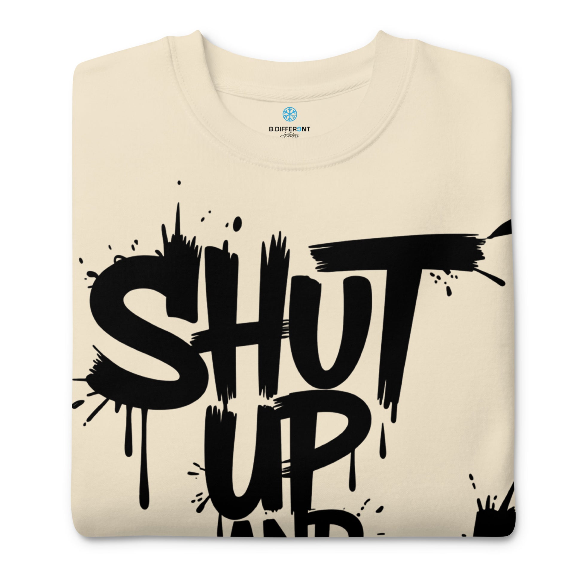 Beige-Shut Up and Paint Graffiti Sweatshirt from B.Different Clothing, folded, graffiti-inspired streetwear