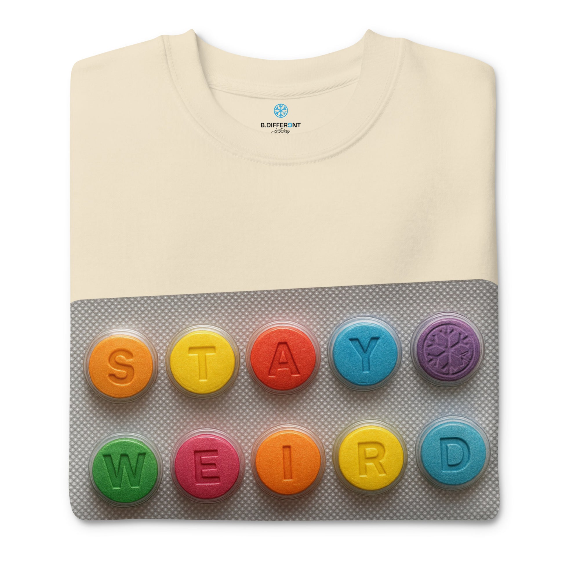Beige-Stay Weird Pills Sweatshirt from B.Different Clothing, folded, graffiti-inspired streetwear