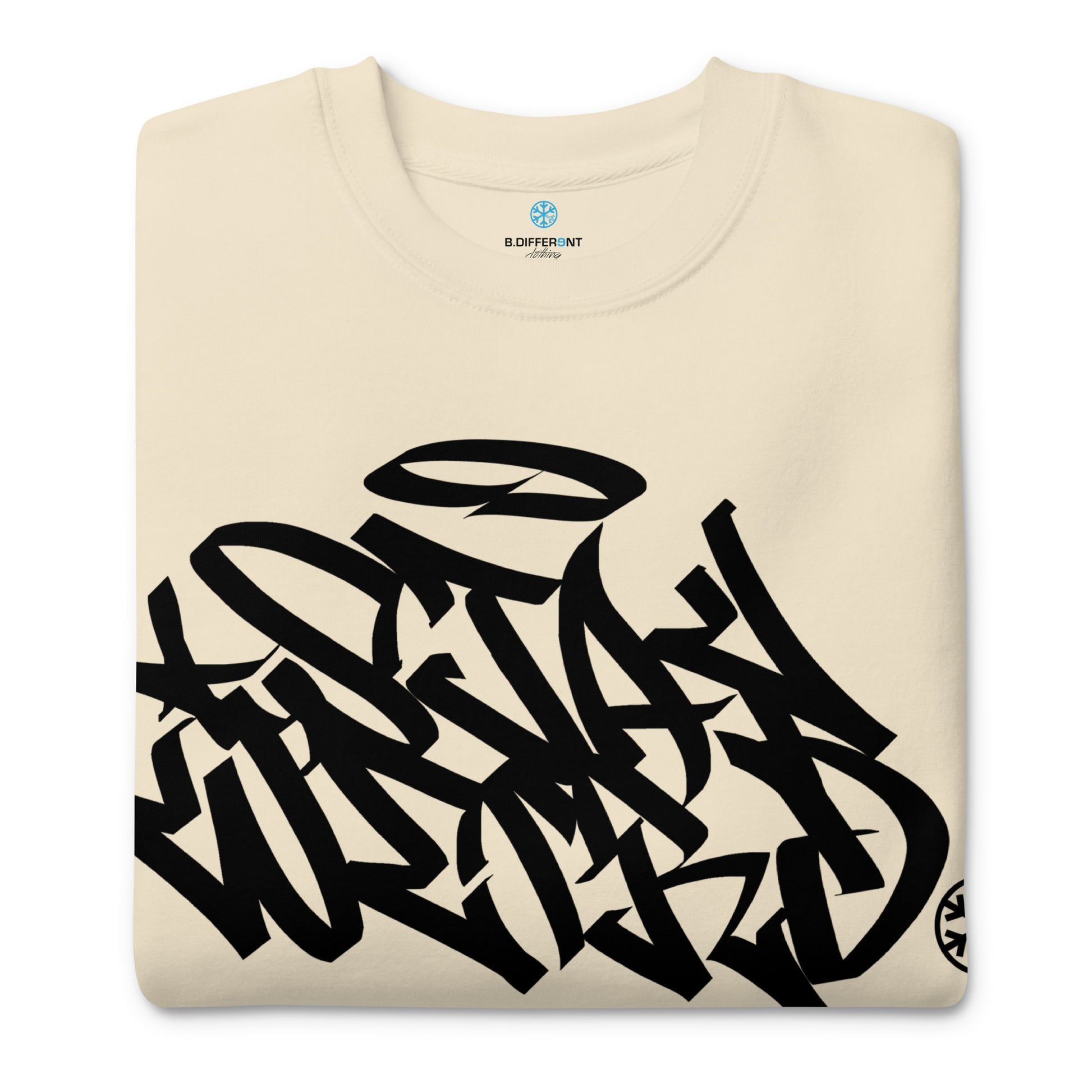 Beige-Stay Weird Graffiti Tag Sweatshirt from B.Different Clothing, folded, graffiti-inspired streetwear