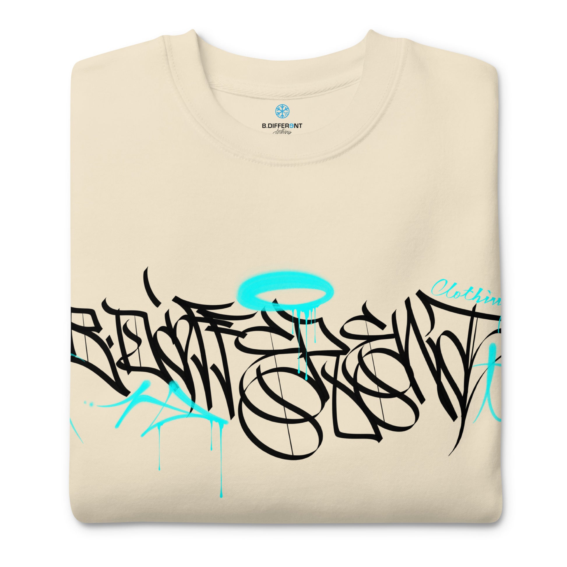 Beige-Caos One Collab Graffiti Sweatshirt from B.Different Clothing, folded, graffiti-inspired streetwear