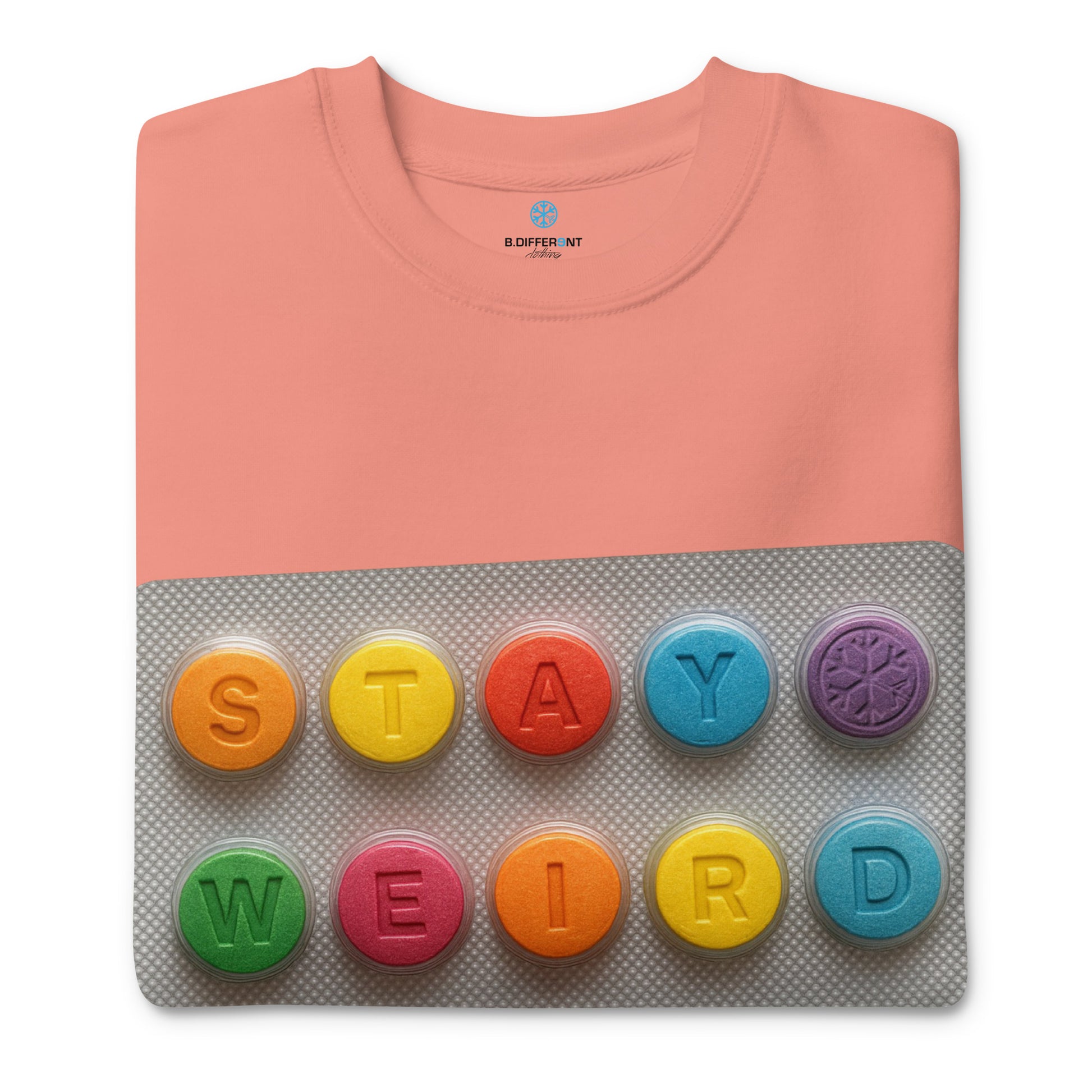 Pink-Stay Weird Pills Sweatshirt from B.Different Clothing, folded, graffiti-inspired streetwear