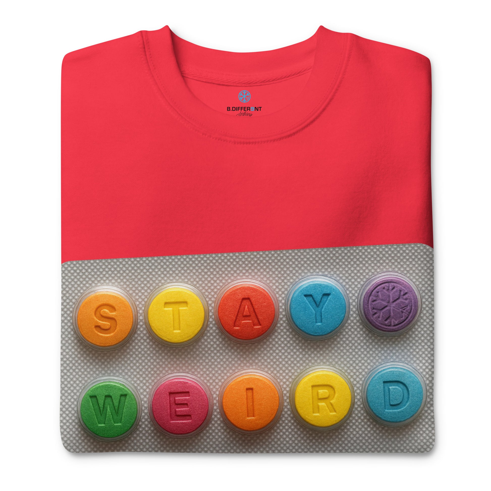 Red-Stay Weird Pills Sweatshirt from B.Different Clothing, folded, graffiti-inspired streetwear