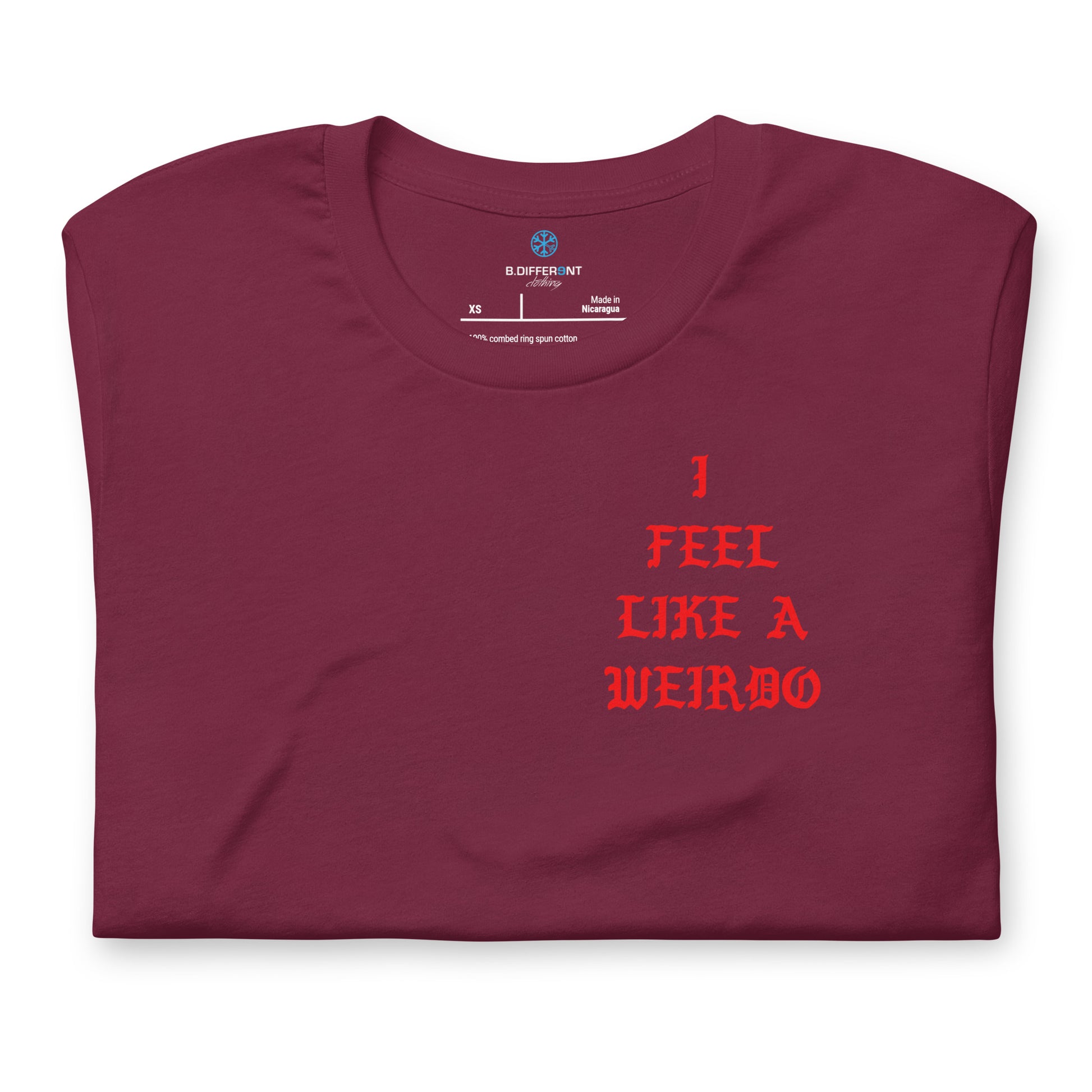 Maroon-I Feel Like a Weirdo Tee from B.Different Clothing, folded, graffiti-inspired streetwear t-shirt