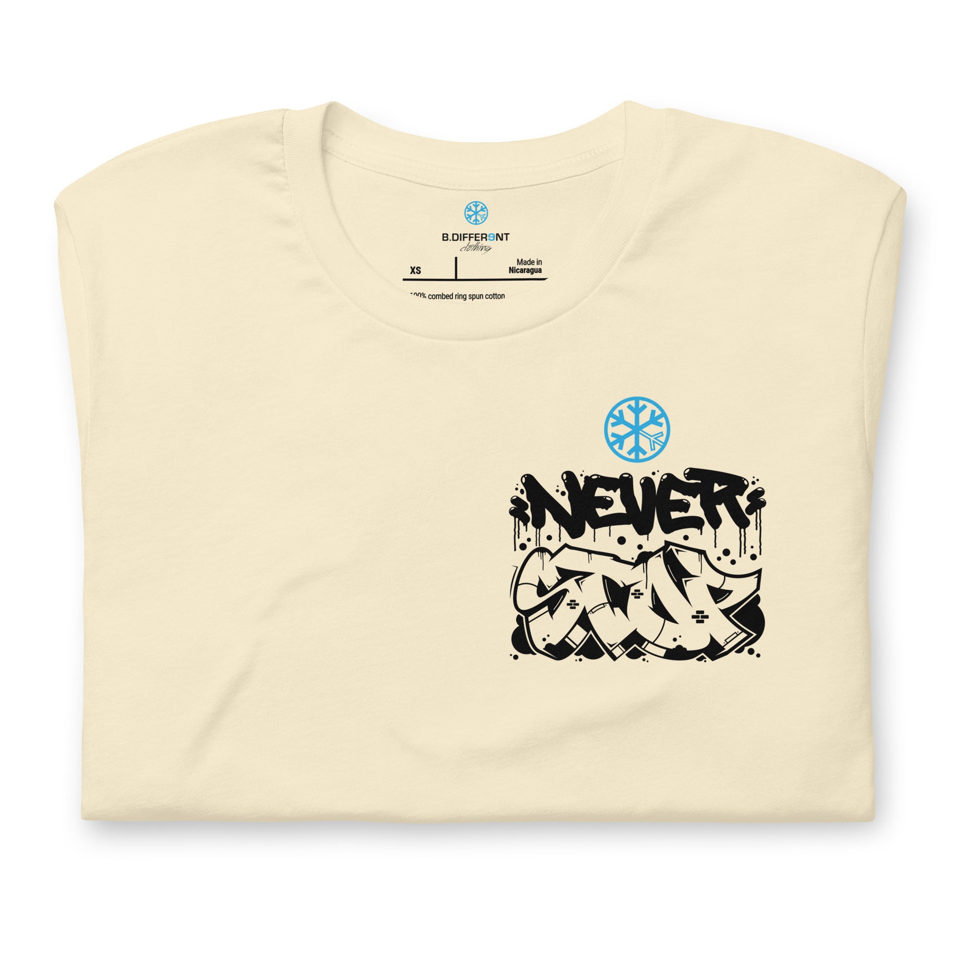Beige-Never Stop Graffiti Character Tee from B.Different Clothing, folded, graffiti-inspired streetwear t-shirt
