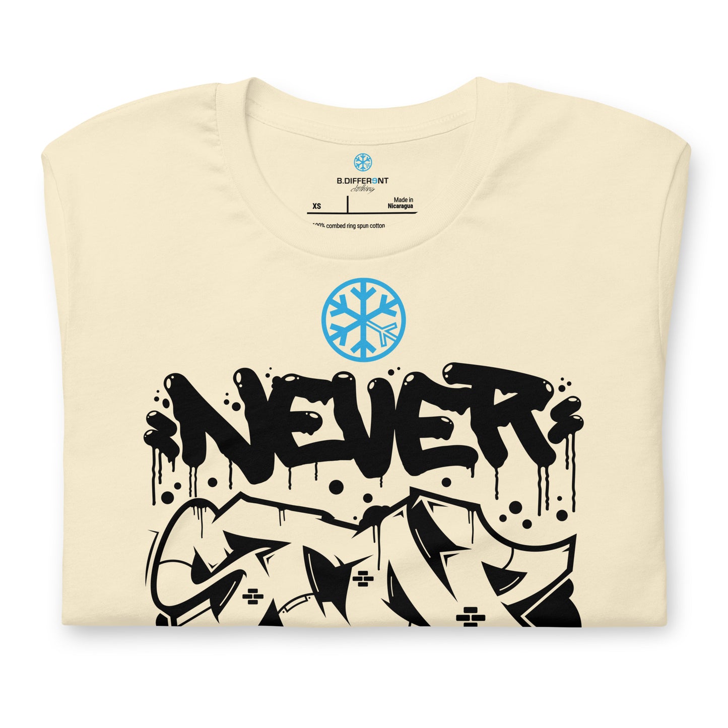 Beige-Never Stop Graffiti Piece Tee from B.Different Clothing, folded, graffiti-inspired streetwear t-shirt