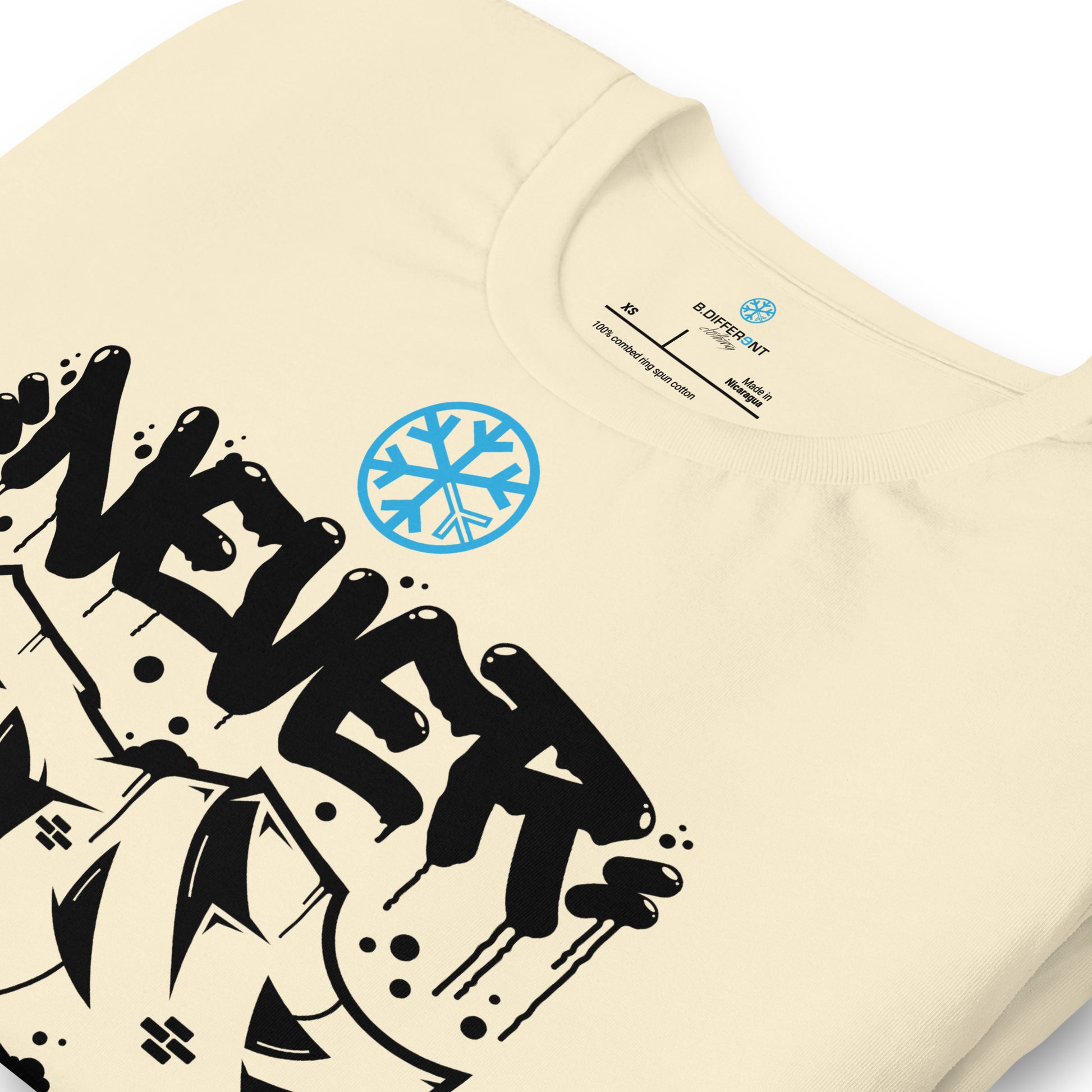 Beige-Never Stop Graffiti Piece Tee from B.Different Clothing, detail, graffiti-inspired streetwear t-shirt