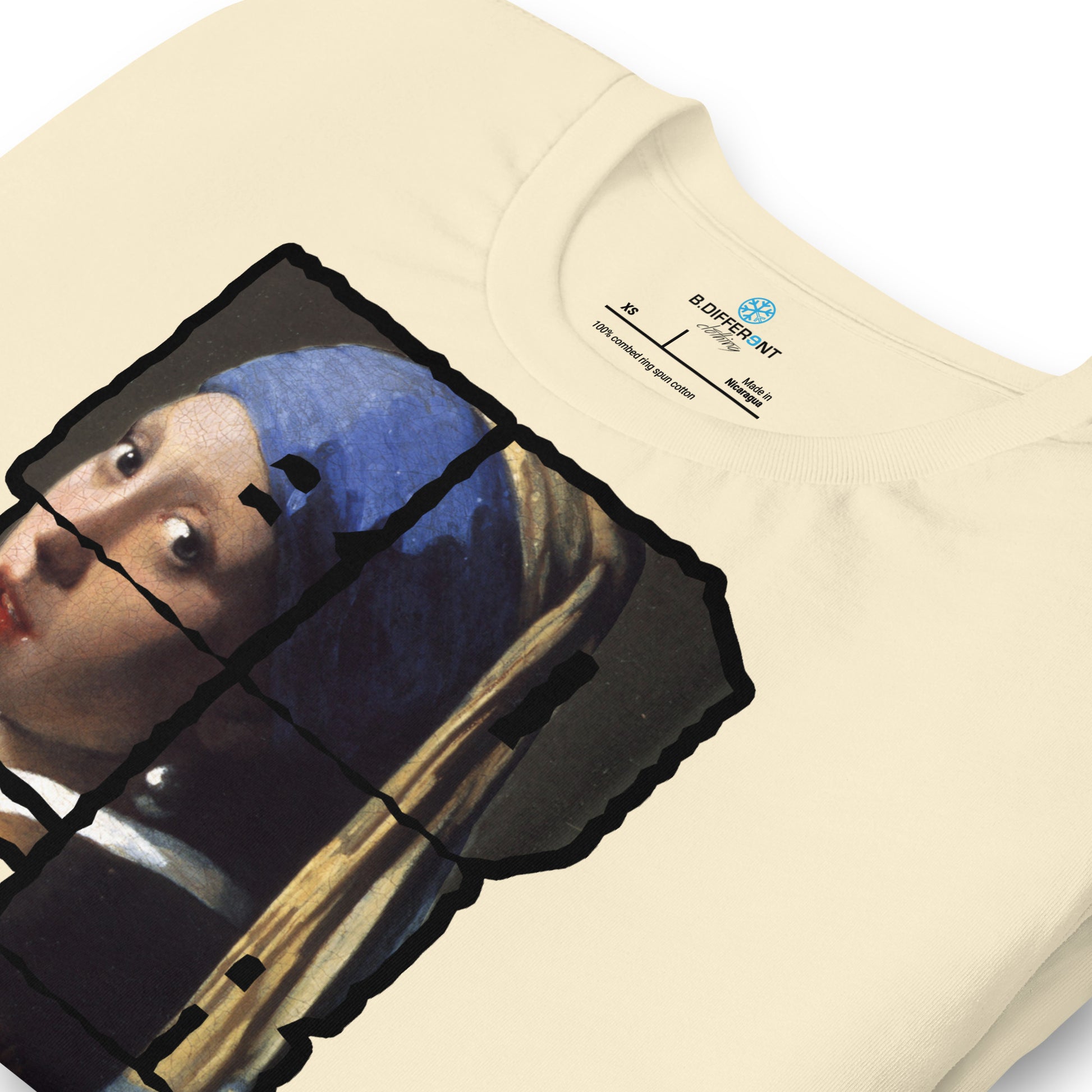 Natural-BDFRNT Blockbuster x Girl With Pearl Earring Tee from B.Different Clothing, zoomed-in view, graffiti-inspired streetwear