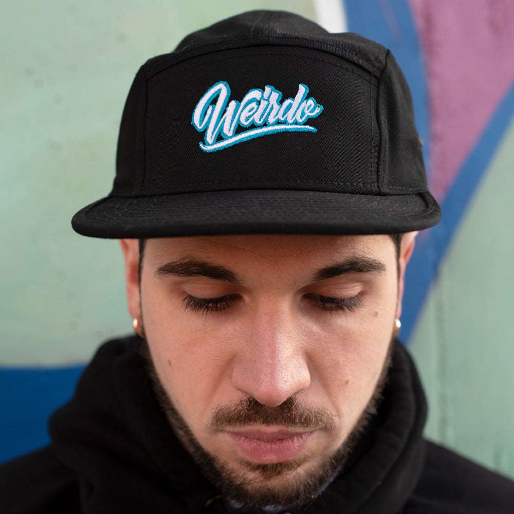 man with snapback 5 panel weirdo black bdifferent clothing independent streetwear street art graffiti