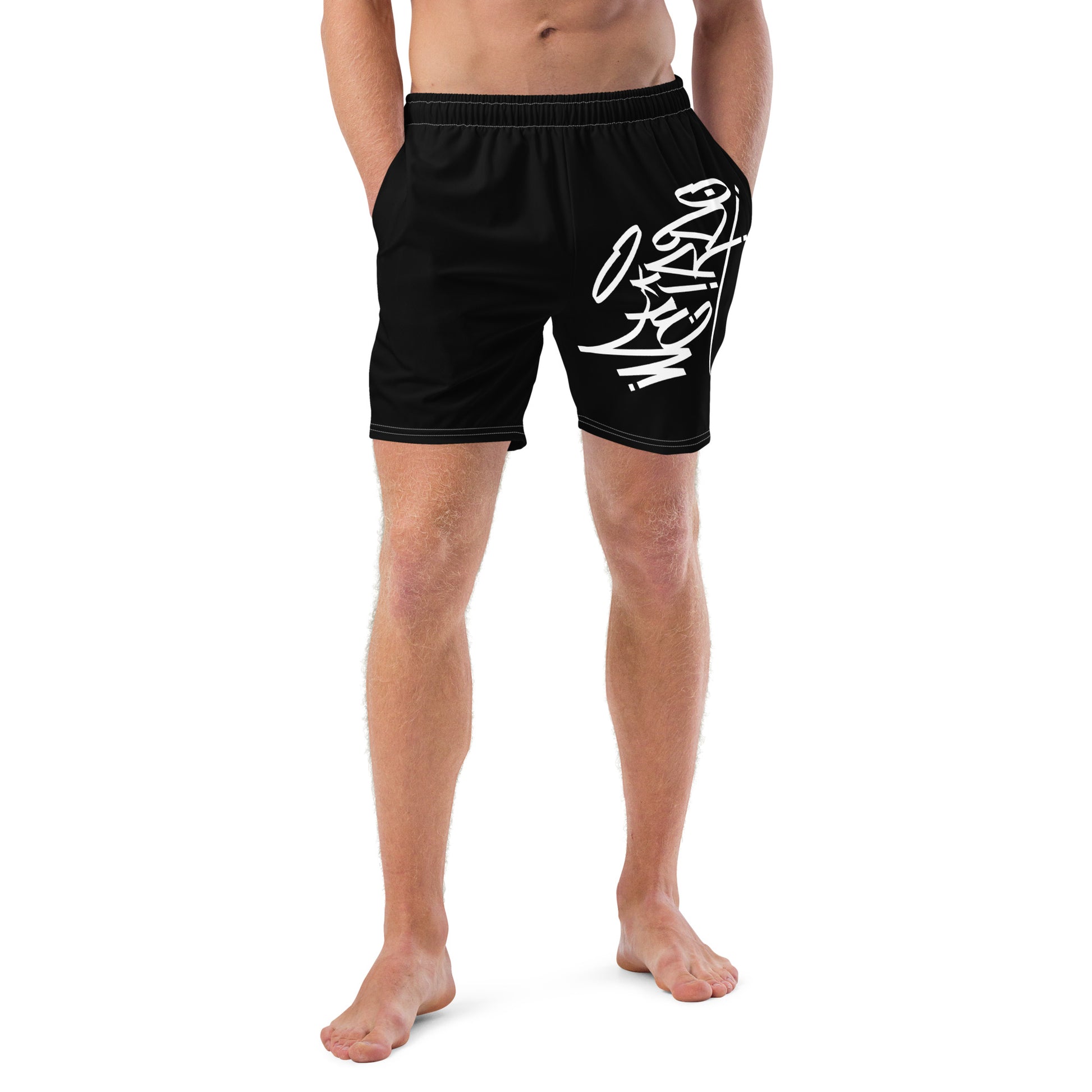 man wearing weirdo tag swim shorts black by B.Different Clothing independent streetwear inspired by street art graffiti