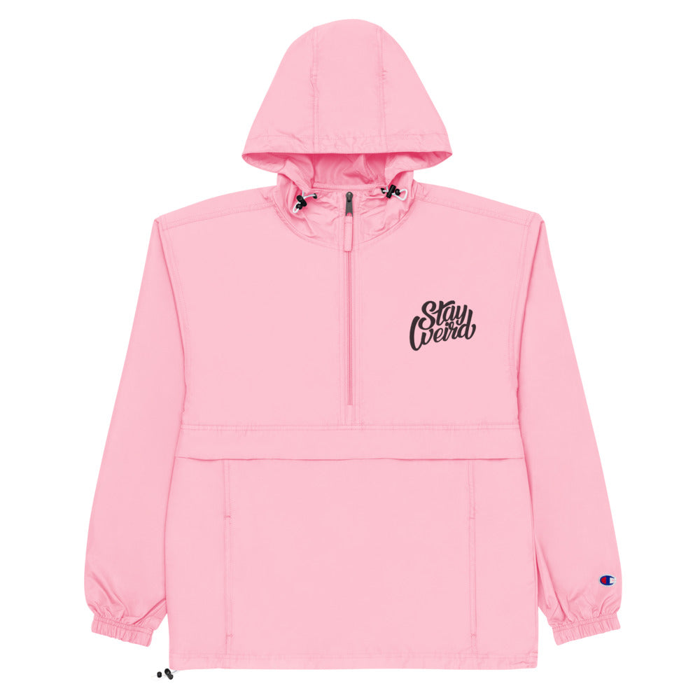 The front of the Stay Weird rain packable pink jacket from b.different clothing independent streetwear inspired by street art