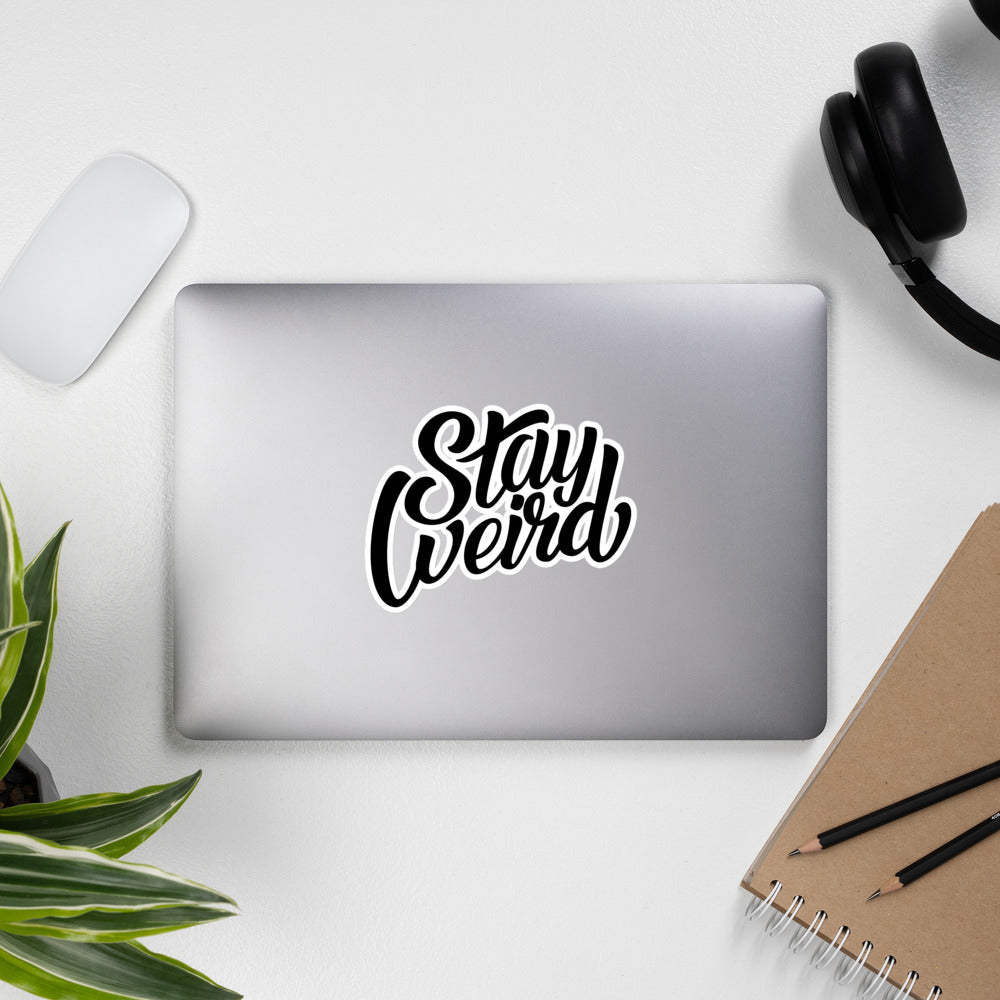 sticker stay weird on a laptop by B.Different Clothing independent streetwear inspired by street art graffiti