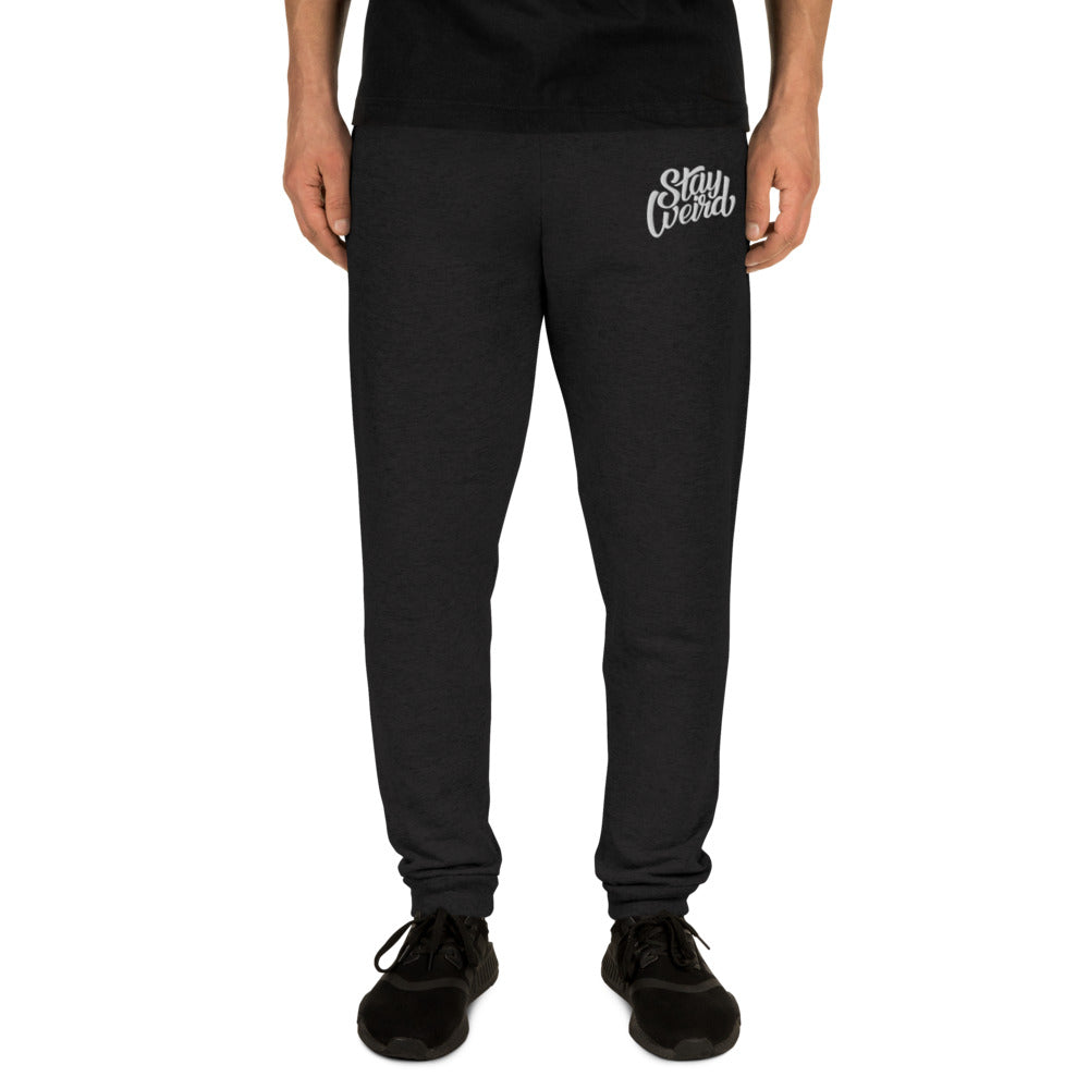 man with black joggers stay weird by B.Different Clothing independent streetwear inspired by street art graffiti